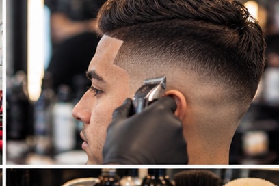 Barber detailing a clean skin fade with clippers